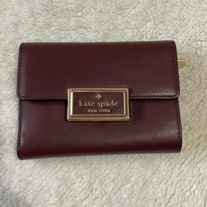 Kate spade medium flap wallet cherrywood color